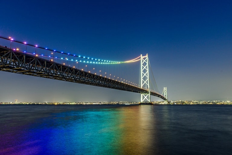 Large ocean bridge decorate in rainbow lights