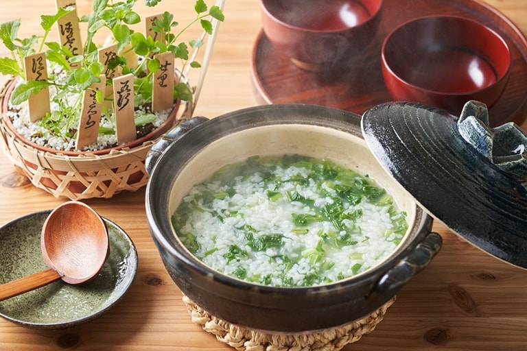 A ceramic pot filled with rice porridge