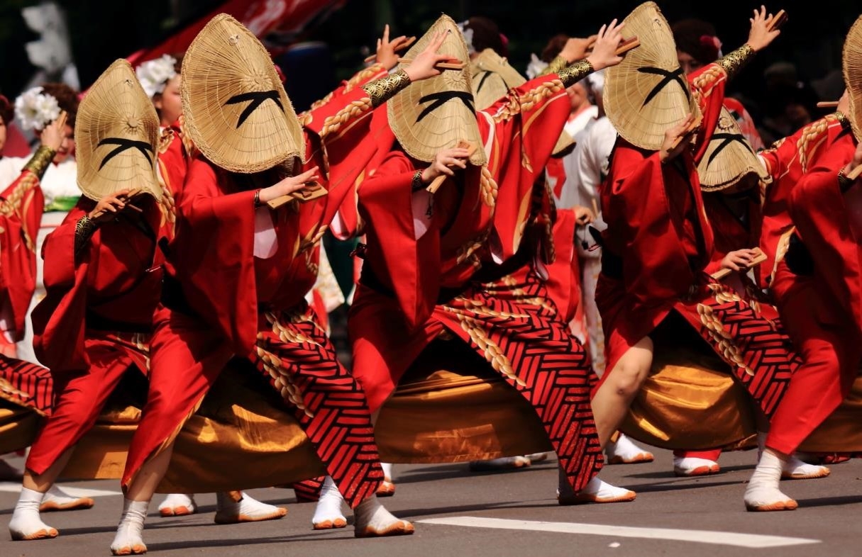 Yosakoi dancers in bright red robes