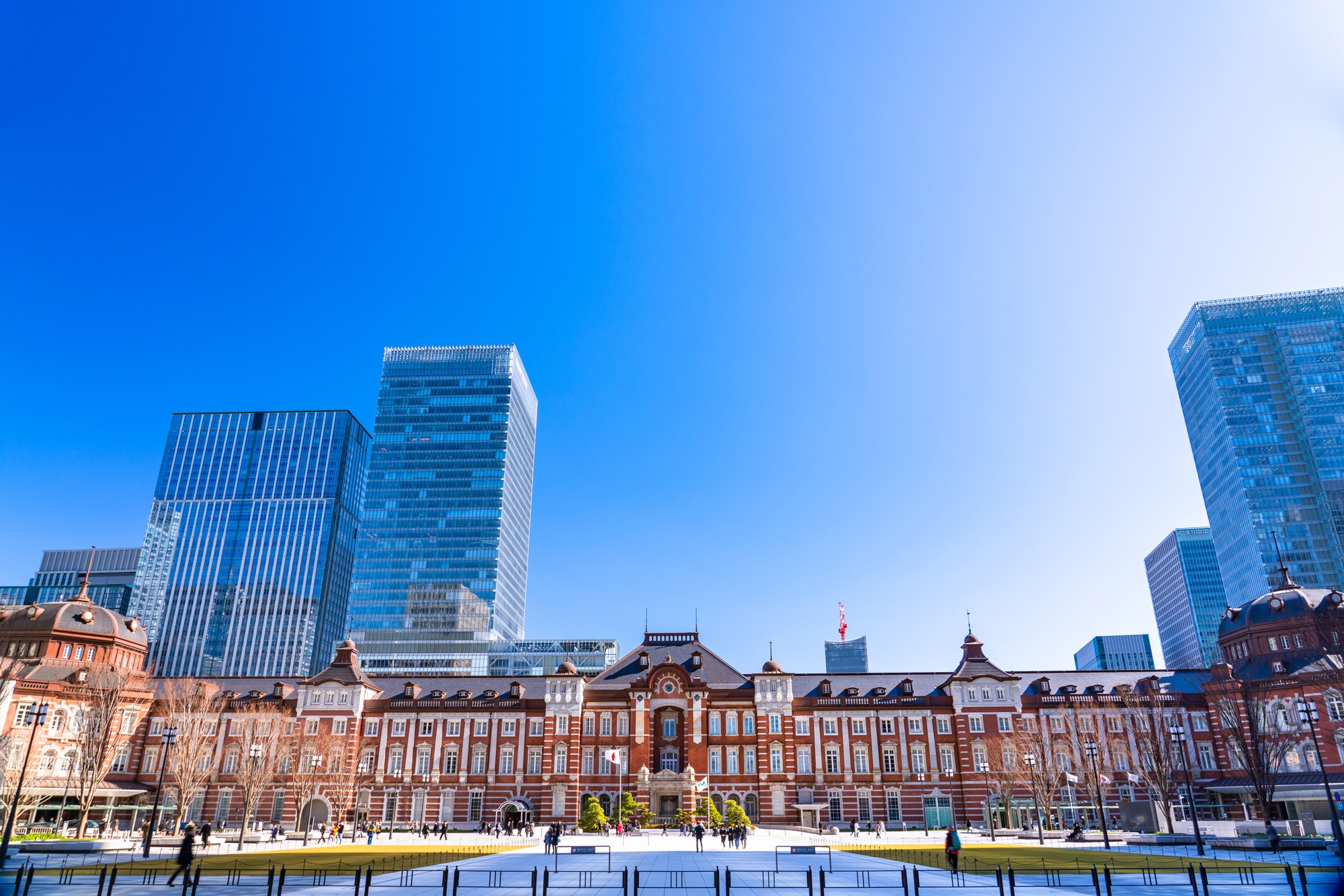 The newly refurbished Tokyo station under a blue sky