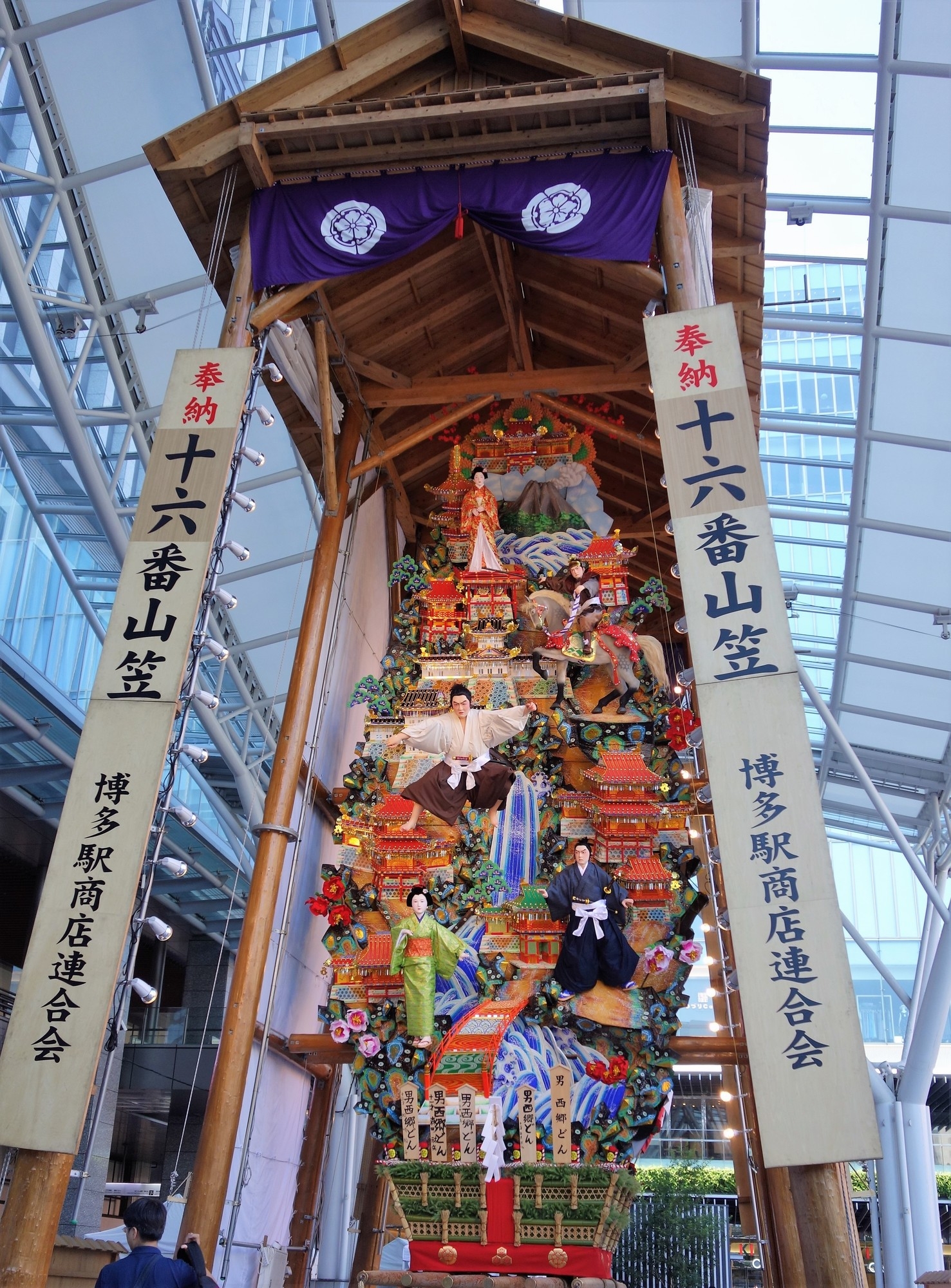 The wooden floats are heavily decorated, often with messages from sponsors