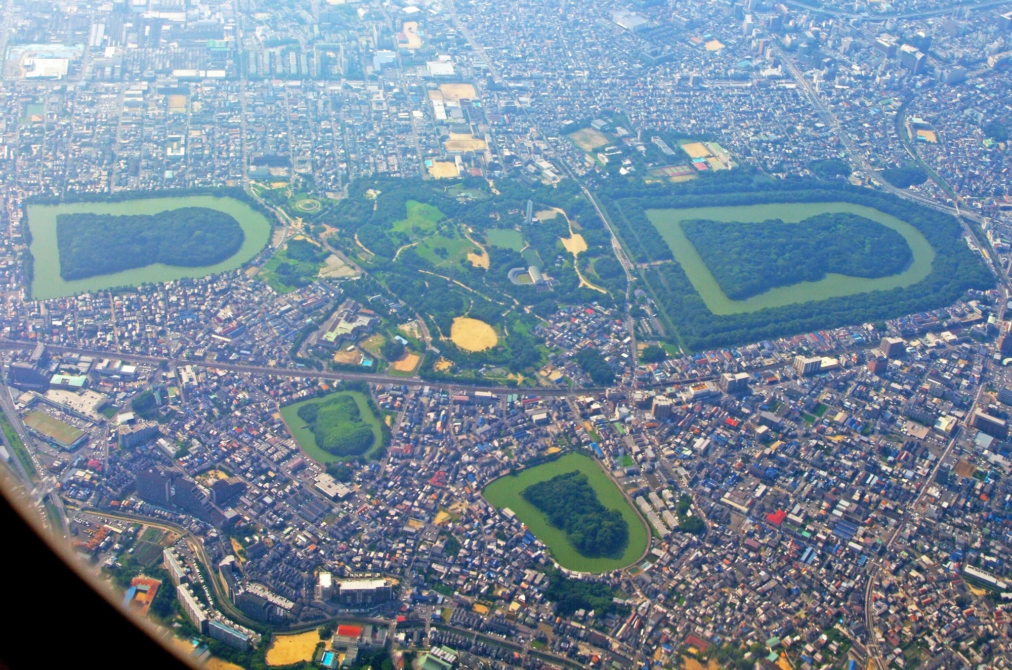 Aerial view of several of the Kofun burial mounds