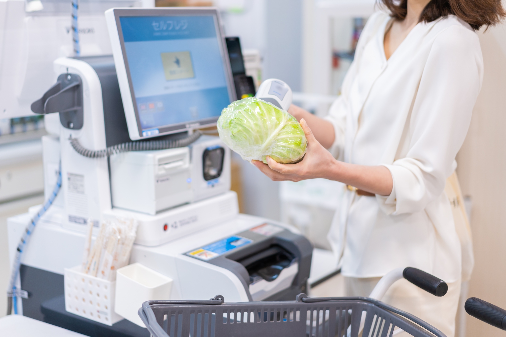 A person buying fresh groceries