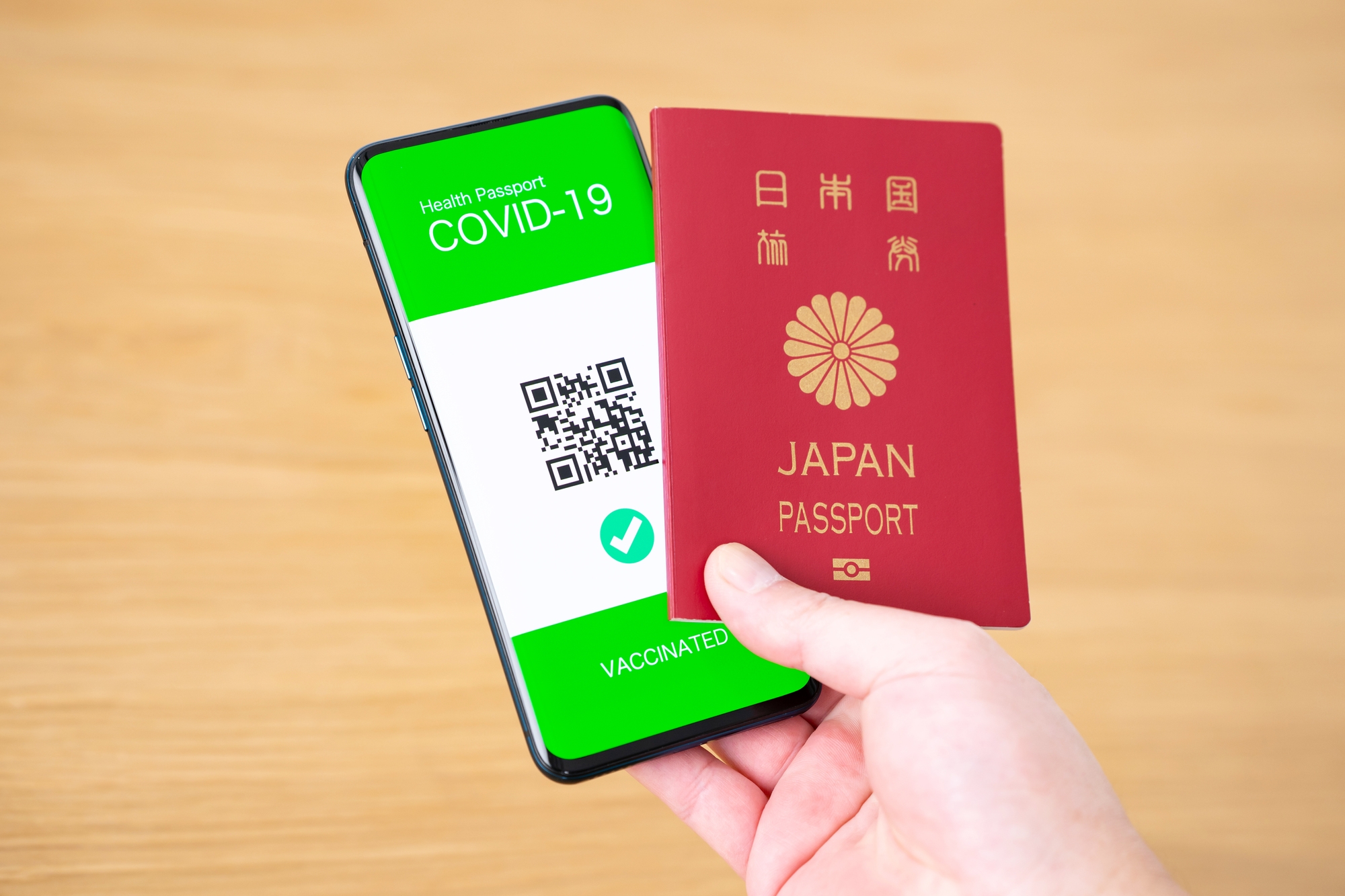 A Japanese passport and a COVID app