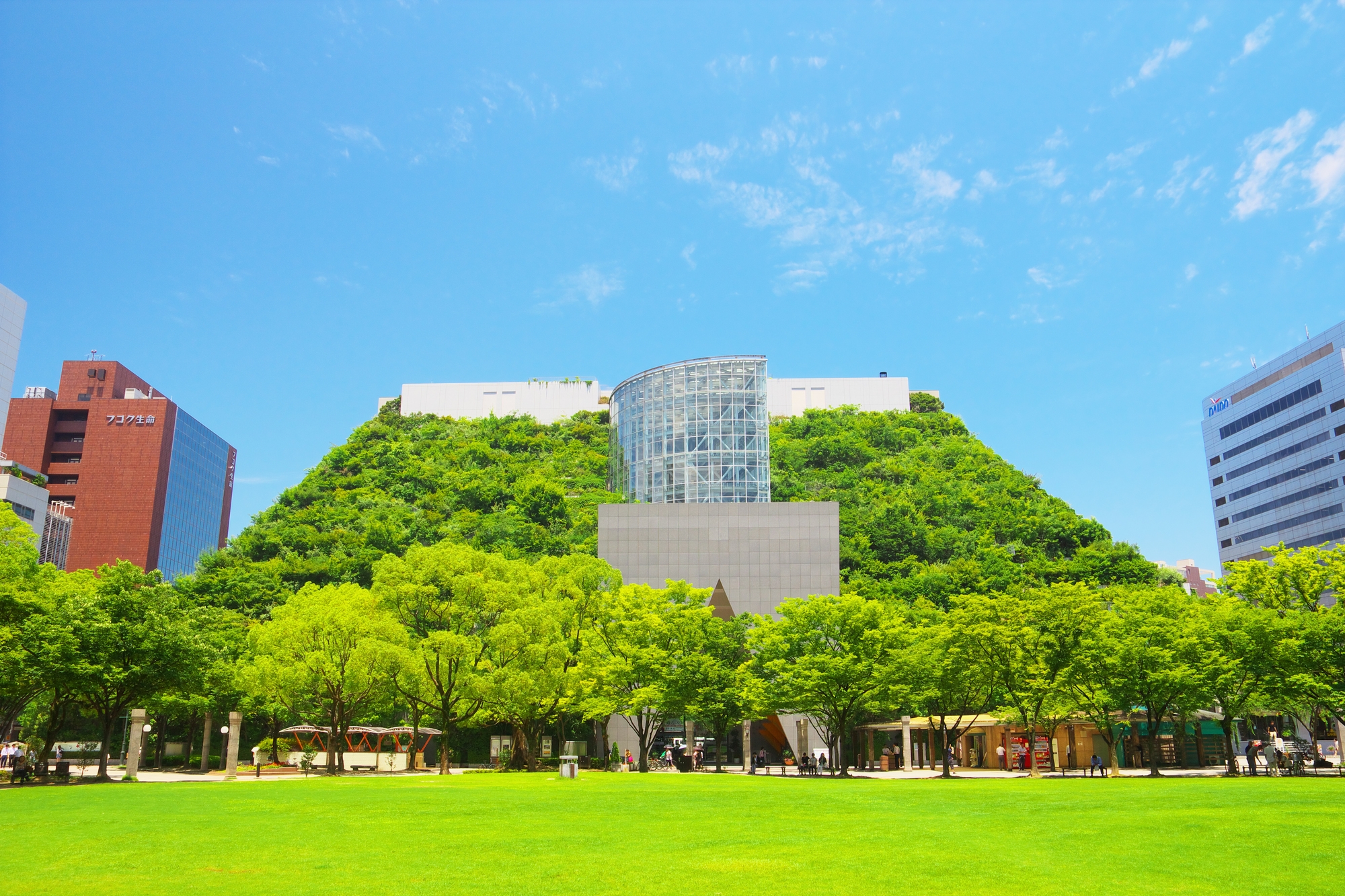 A large building covered in greenery