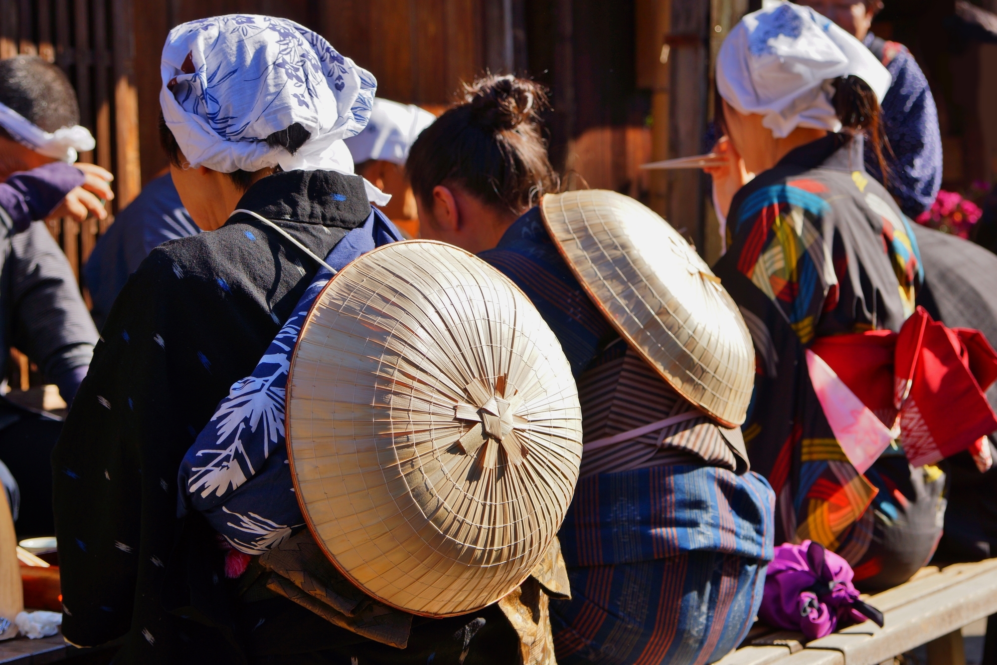 People in Edo-era clothing sitting outside