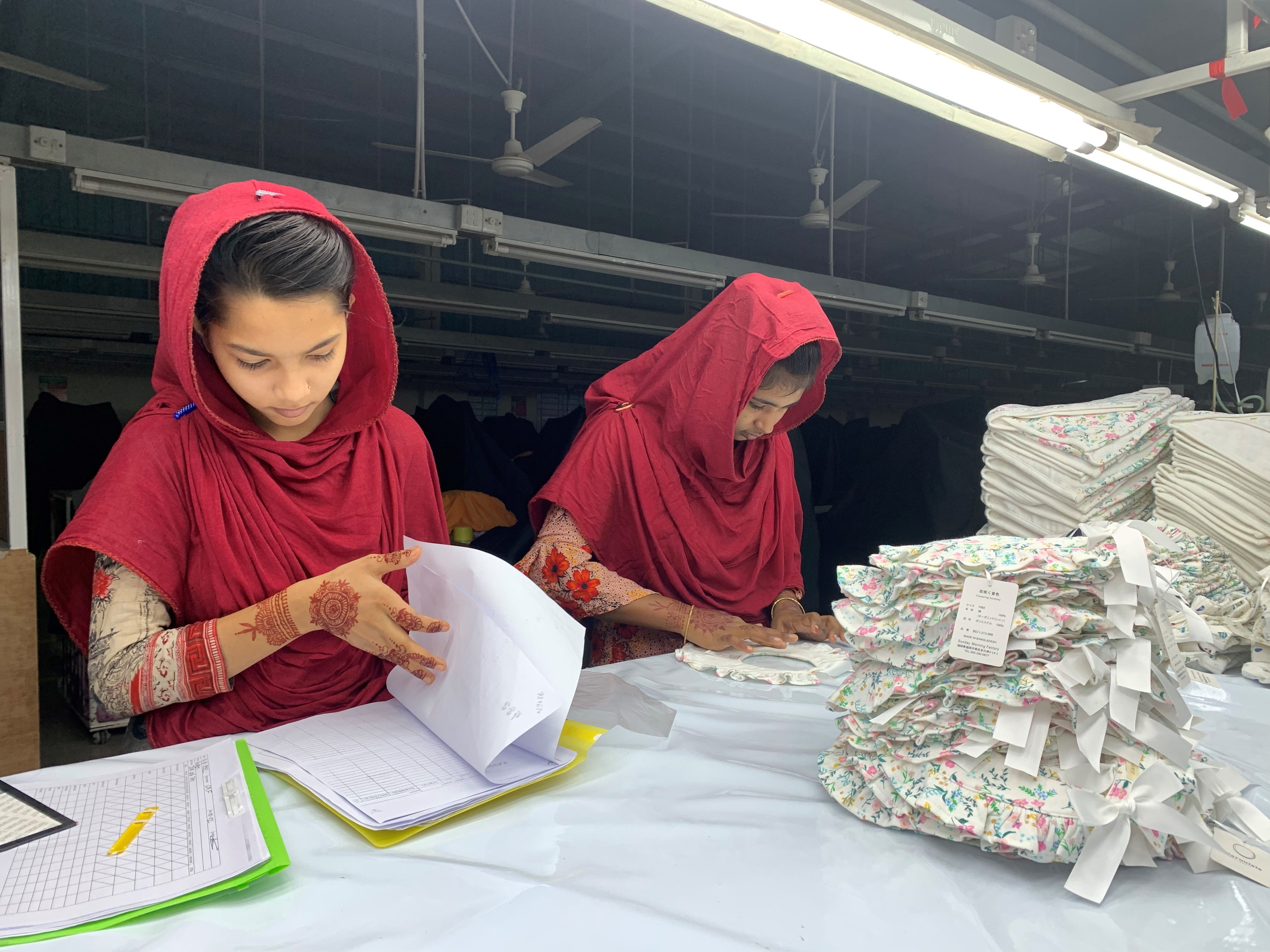 Two Bangladeshi women working in a factory