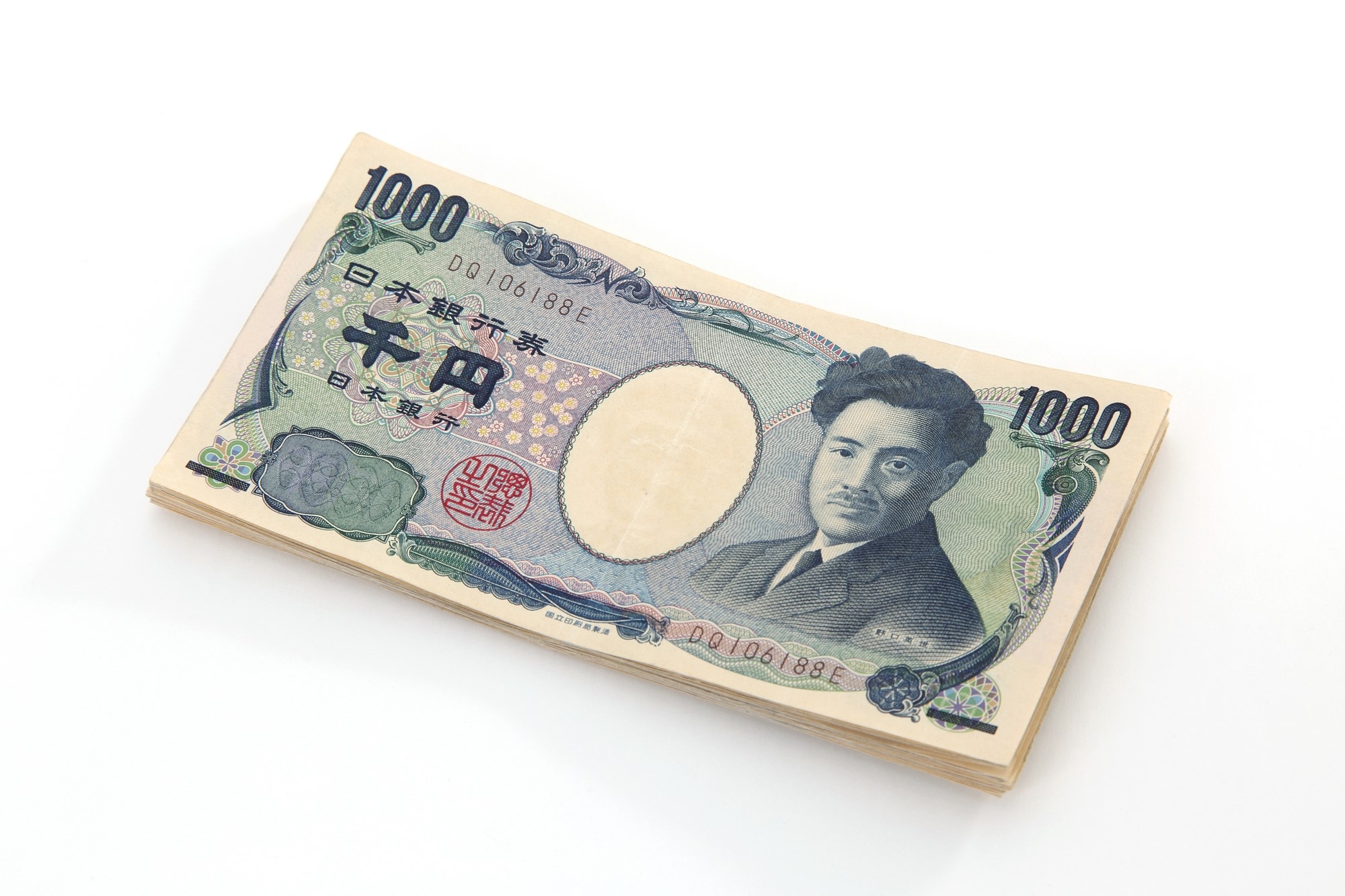 A statck of 1000 yen bills, with Hideyo Nogushi's face 