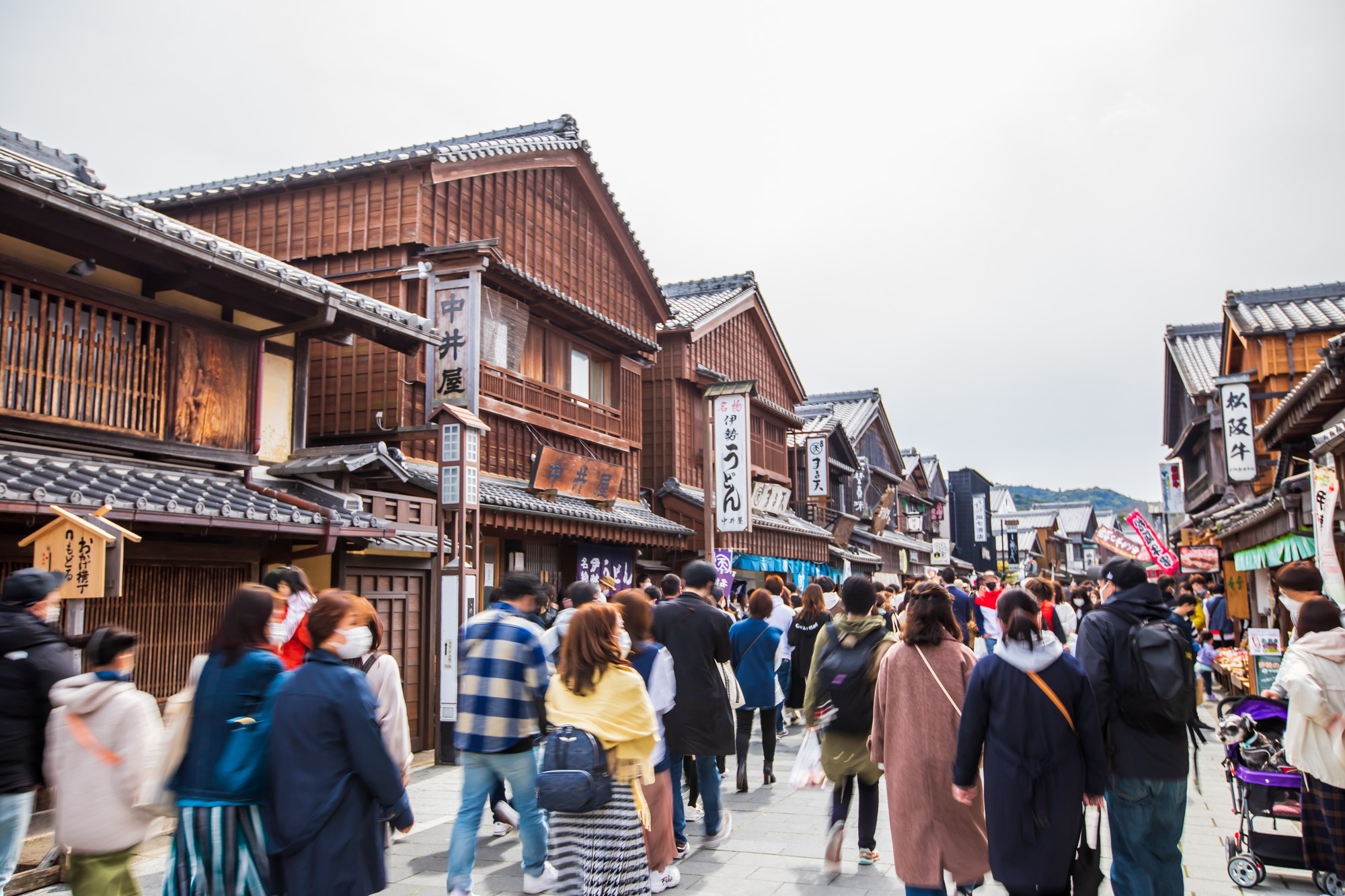 Market street lined with old-style buildings selling food and souvenirs