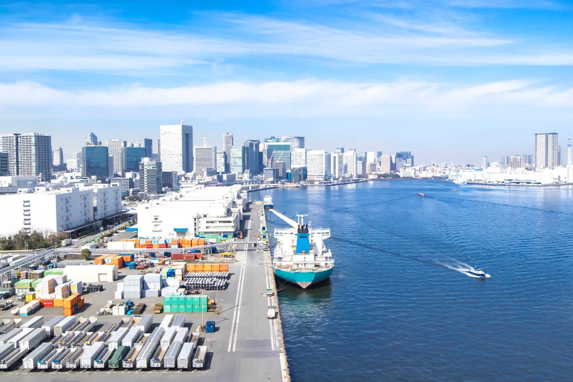 A cargo ship docked at harbor