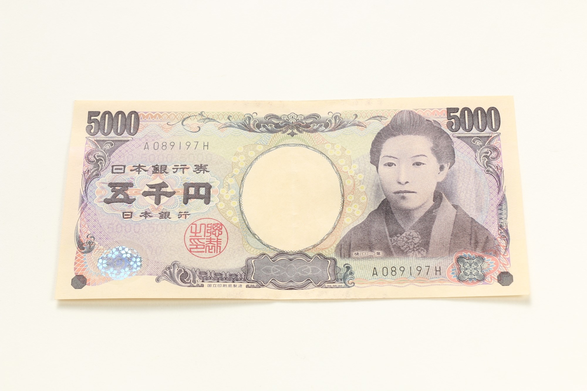 The 5,000-yen bill in use since 2004, depicting Higuchi