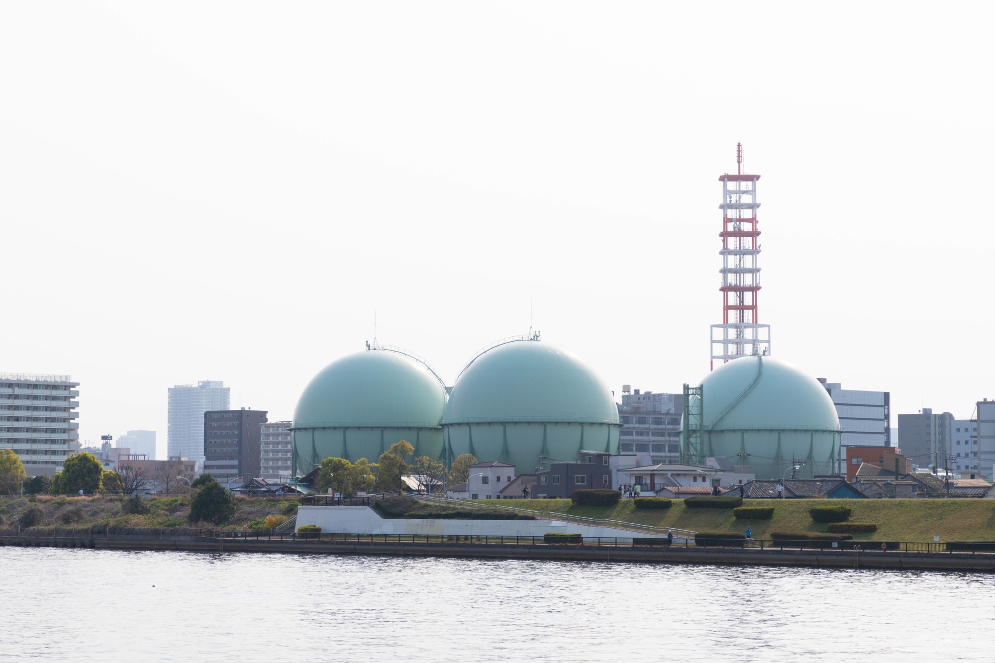 Liquid gas tanks by a river in Tokyo 