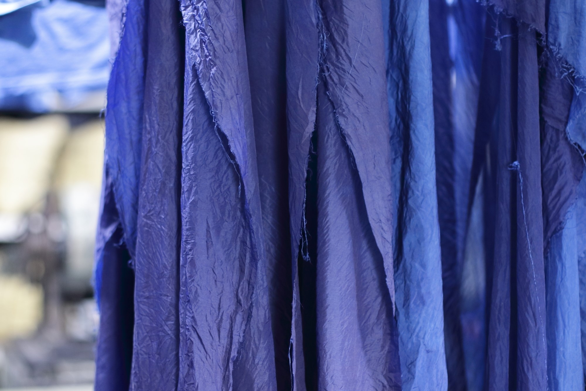 Clothes of blue gradation hanging down