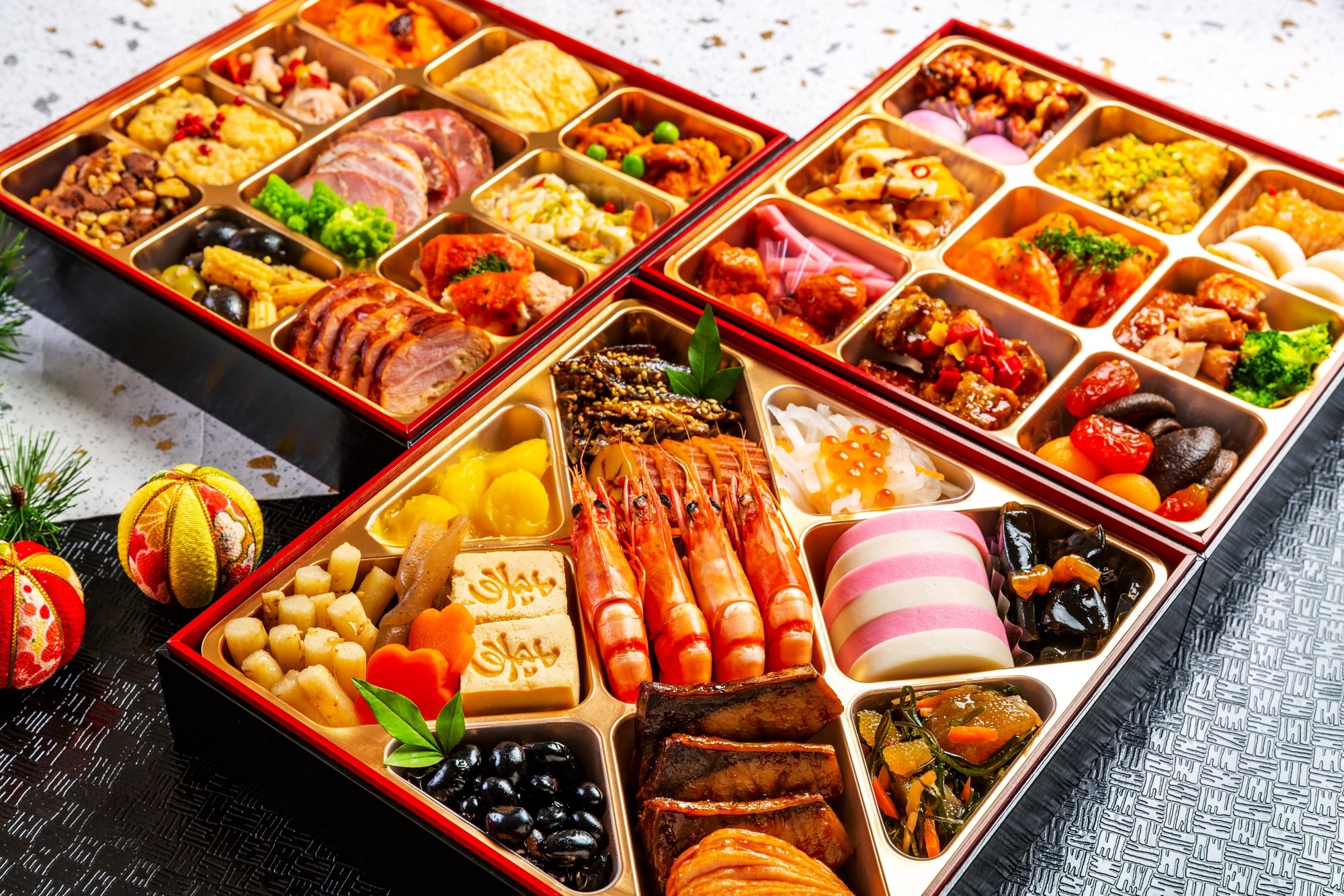 Colorful Osechi foods packed in large boxes