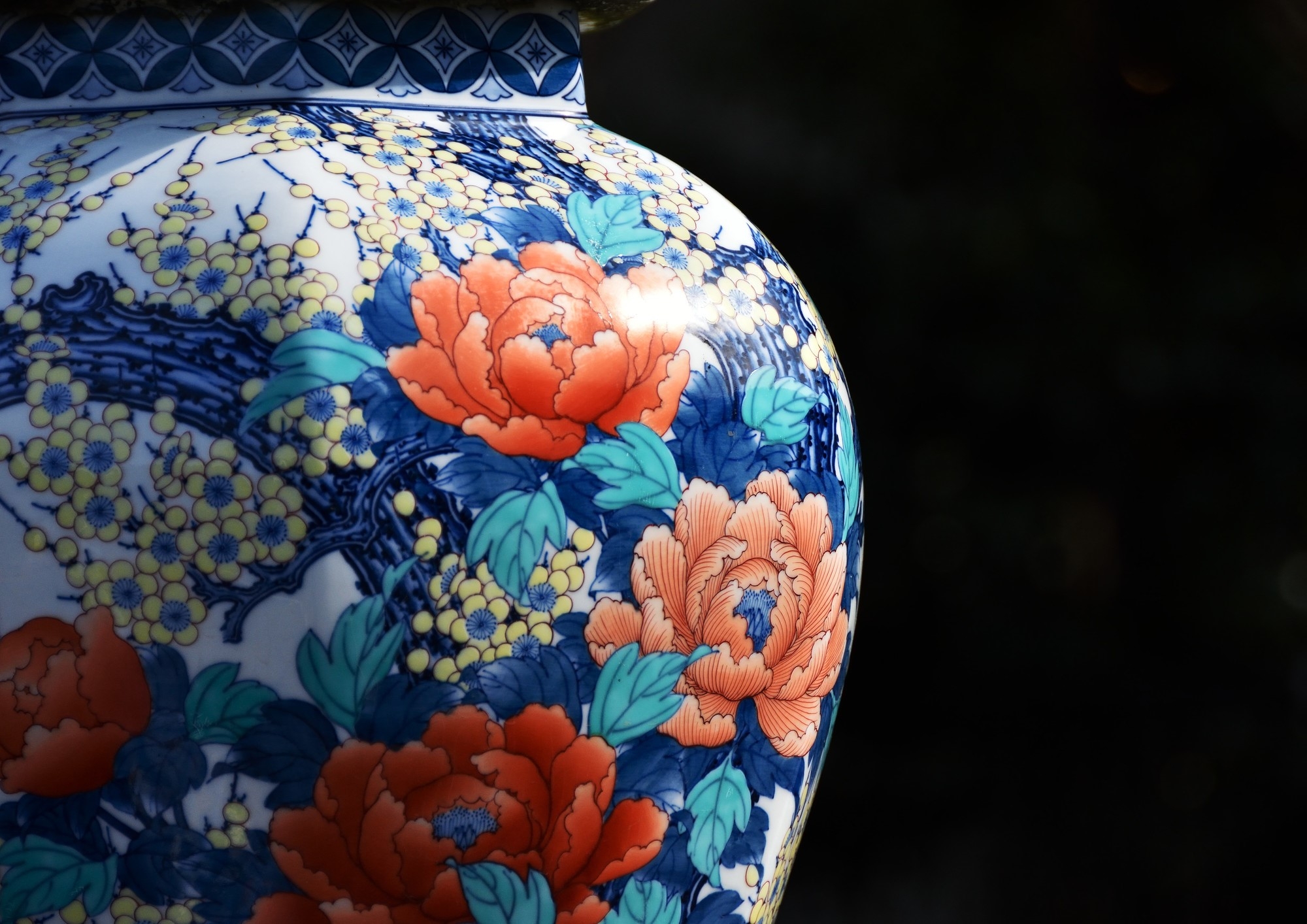 A vase with brightly colored flowers