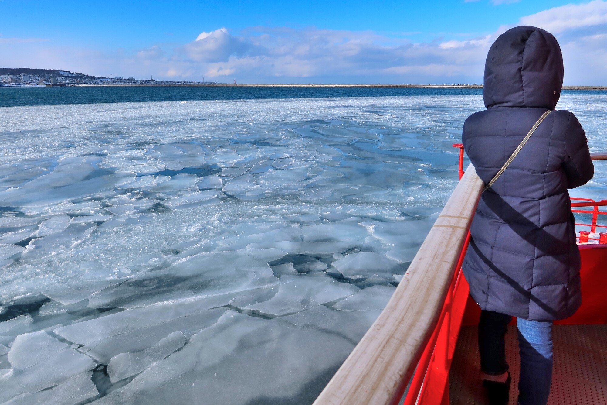 A boat moving on drift ice 