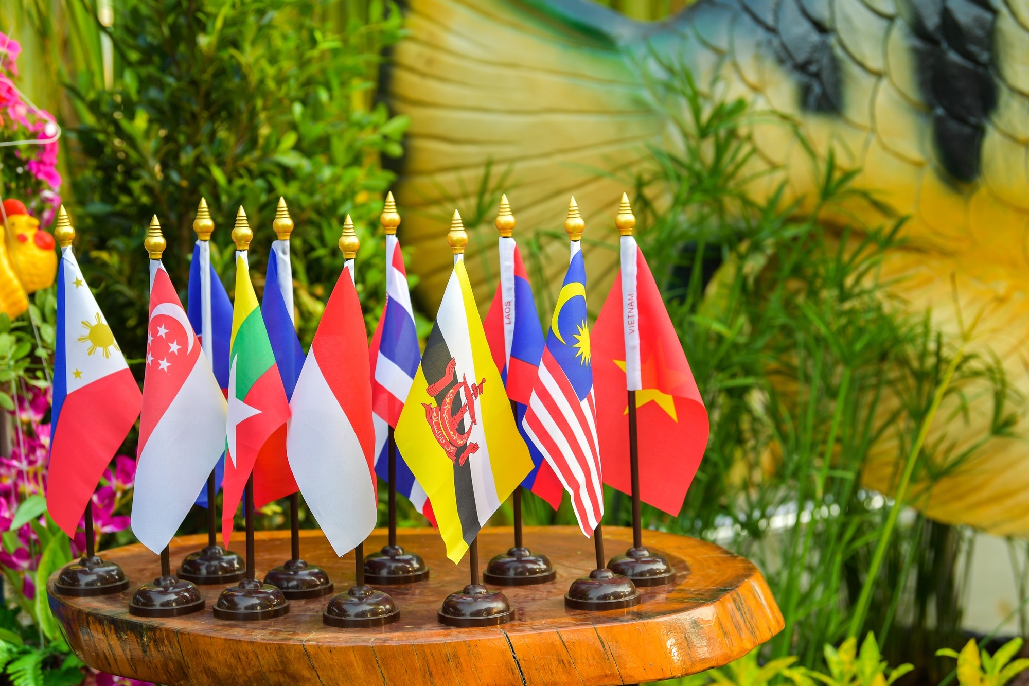 Flags of ASEAN country members on a table